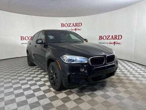 2019 BMW X6 for sale at BOZARD FORD in Saint Augustine FL