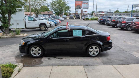 2013 Dodge Avenger for sale at AUTO WORLD AUTO SALES in Rapid City SD
