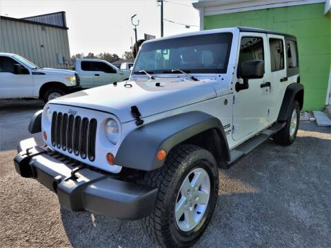 2013 Jeep Wrangler Unlimited for sale at Caesars Auto Sales in Longwood FL
