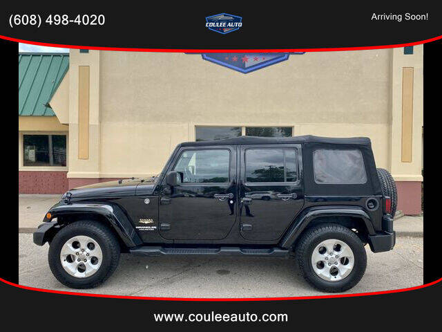 2013 Jeep Wrangler Unlimited for sale at Coulee Auto in La Crosse WI