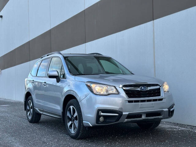 2018 Subaru Forester for sale at Phoenix Motor Co in Romulus, MI