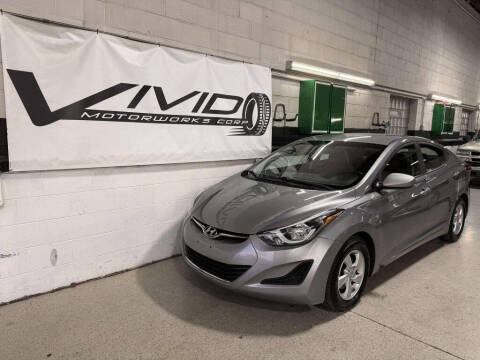 2014 Hyundai Elantra for sale at VIVID MOTORWORKS, CORP. in Villa Park IL