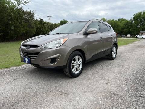 2012 Hyundai Tucson for sale at The Car Shed in Burleson TX