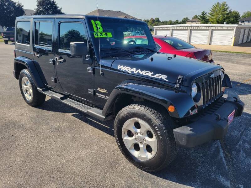 2013 Jeep Wrangler Unlimited for sale at Cooley Auto Sales in North Liberty IA