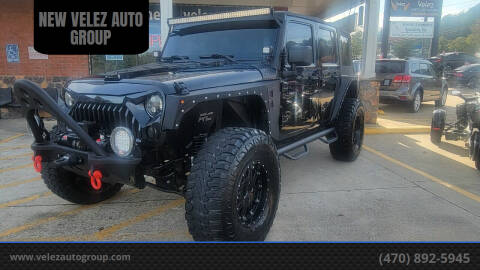 2012 Jeep Wrangler Unlimited for sale at NEW VELEZ AUTO GROUP in Gainesville GA