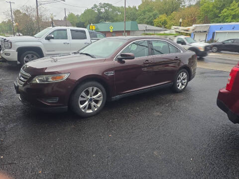 2010 Ford Taurus for sale at Maximum Auto Group II INC in Cortland OH