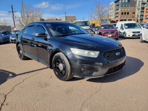 2013 Ford Taurus for sale at BERKENKOTTER MOTORS in Brighton CO