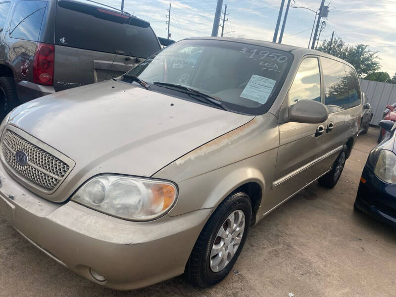 2004 Kia Sedona for sale at Buy-Fast Autos in Houston TX