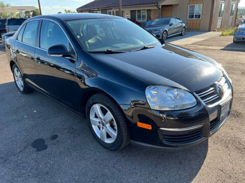 2009 Volkswagen Jetta for sale at BERKENKOTTER MOTORS in Brighton CO