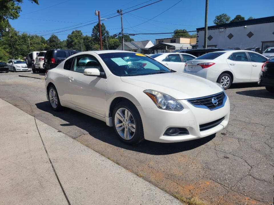 2012 Nissan Altima for sale at DAGO'S AUTO SALES LLC in Dalton, GA