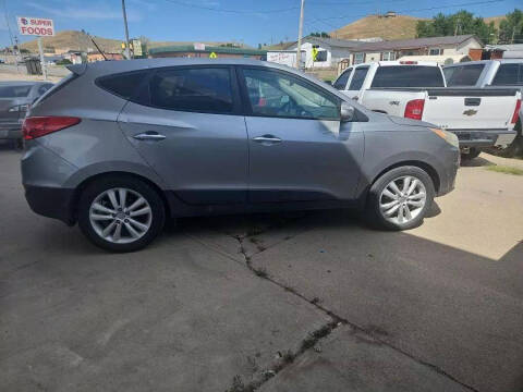 2013 Hyundai Tucson for sale at iDent Auto Sales & iDent Auto Care in Rapid City SD