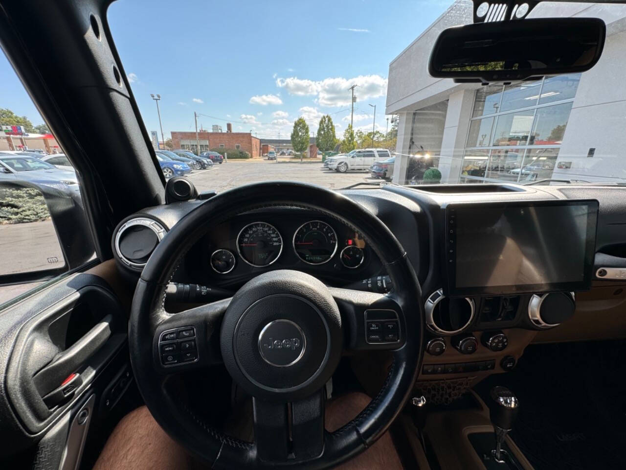 2014 Jeep Wrangler Unlimited for sale at Opus Motorcars in Utica, MI