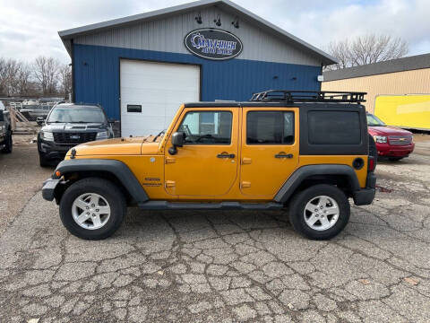 2014 Jeep Wrangler Unlimited for sale at Maverick Automotive in Arlington MN