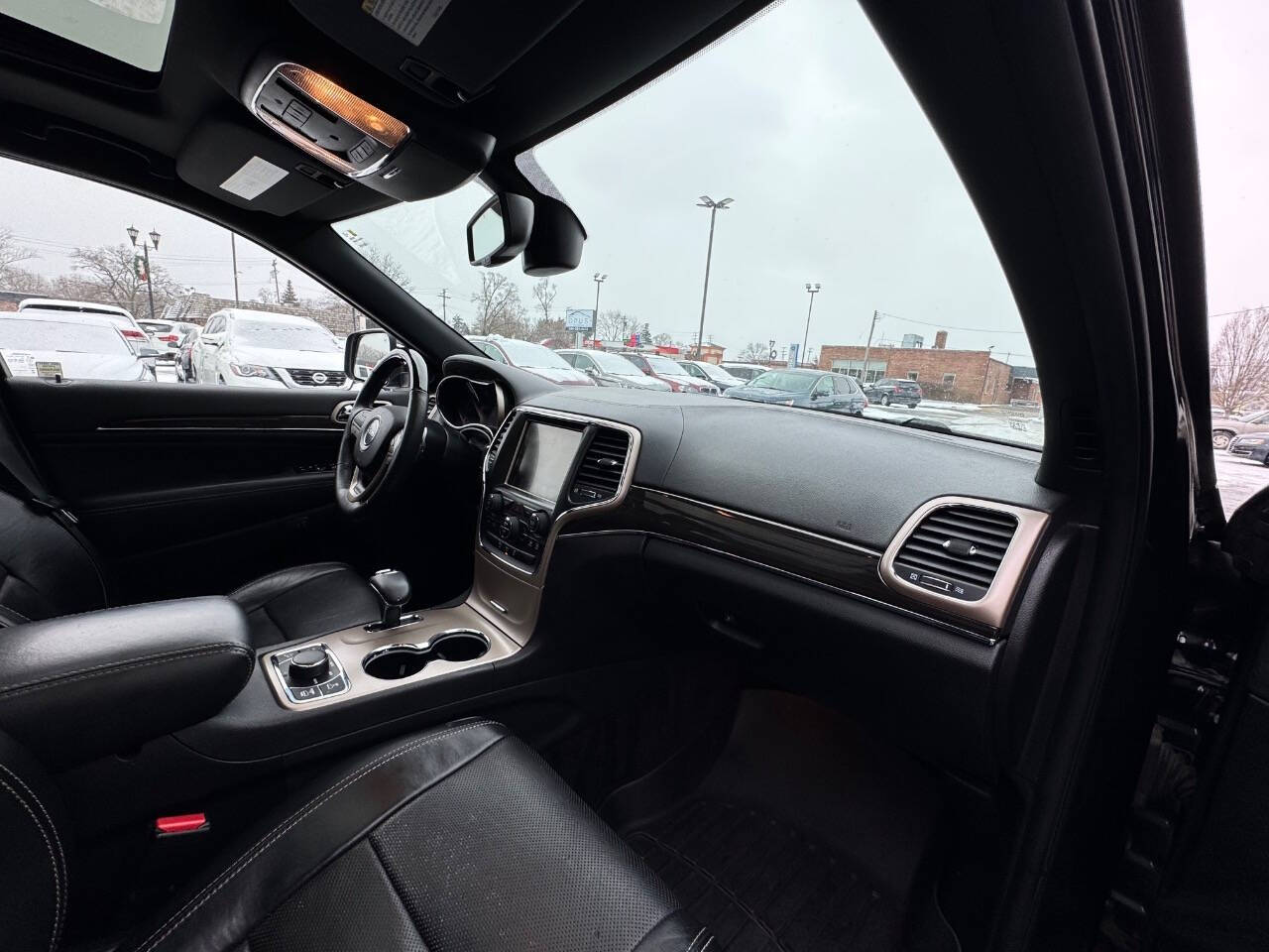 2015 Jeep Grand Cherokee for sale at Opus Motorcars in Utica, MI