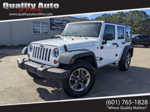 2013 Jeep Wrangler Unlimited for sale at Quality Auto of Collins in Collins MS