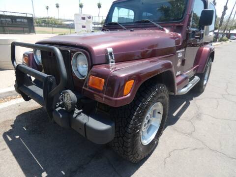2001 Jeep Wrangler for sale at J & E Auto Sales in Phoenix AZ