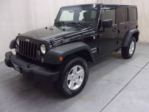 2014 Jeep Wrangler Unlimited for sale at Paquet Auto Sales in Madison OH