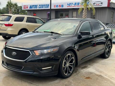 2014 Ford Taurus for sale at DJA Autos Center in Orlando FL