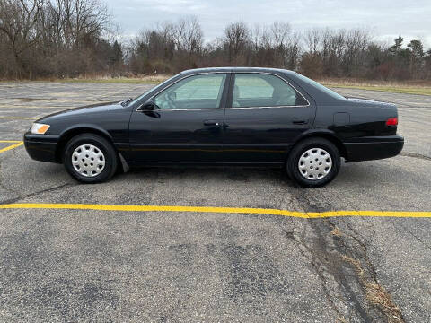 1998 Toyota Camry for sale at Caruzin Motors in Flint MI