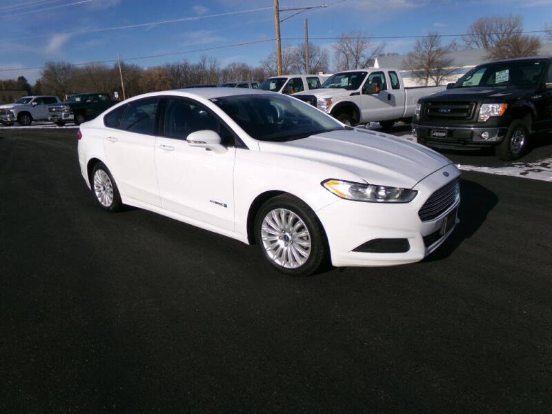 2016 Ford Fusion Hybrid for sale at VELISHEK AUTO SALES in Prior Lake MN