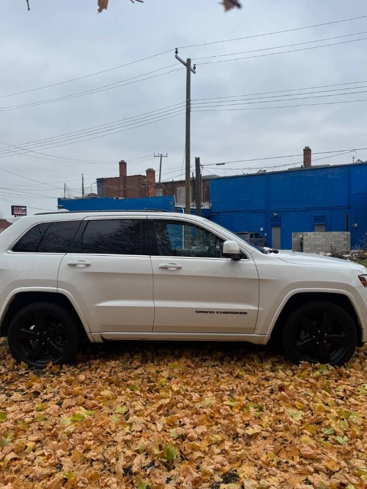 2014 Jeep Grand Cherokee for sale at H & H AUTO GROUP in Detroit, MI