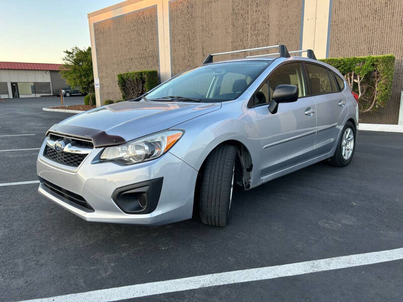 2014 Subaru Impreza for sale at Exelon Auto Sales in Auburn WA