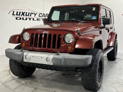 2010 Jeep Wrangler Unlimited for sale at Luxury Car Outlet in West Chicago IL