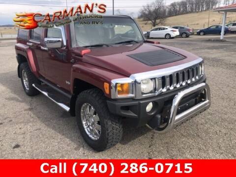 2010 HUMMER H3 for sale at Carmans Used Cars & Trucks in Jackson OH