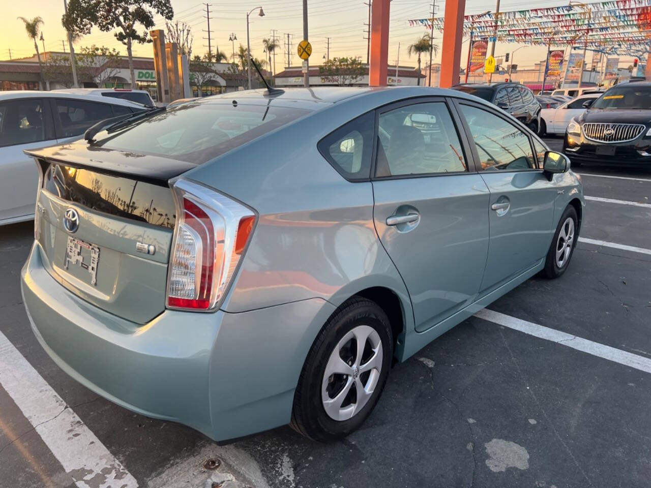 2012 Toyota Prius for sale at Unique Auto Sales, Inc. in Bell, CA