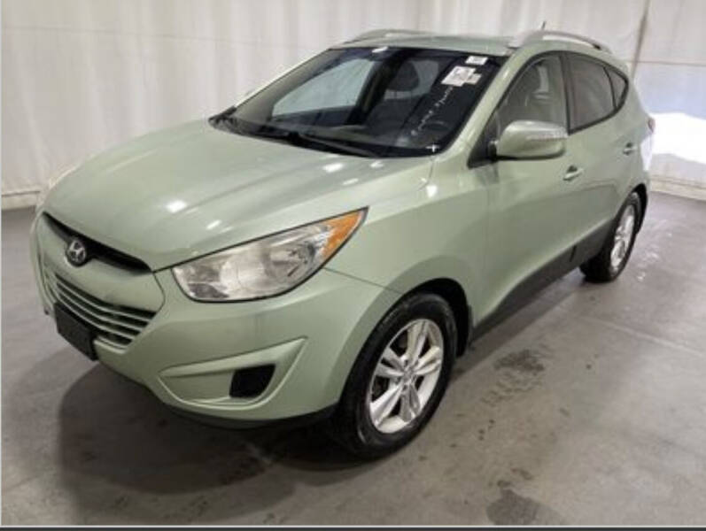 2012 Hyundai Tucson for sale at AMZ Auto Center in Rockland MA