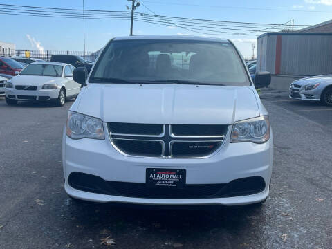 2014 Dodge Grand Caravan for sale at A1 Auto Mall LLC in Hasbrouck Heights NJ