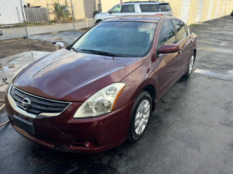 2011 Nissan Altima for sale at MITCHELL MOTOR CARS in Pompano Beach FL