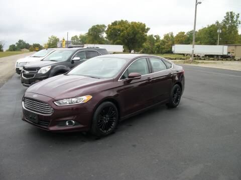 2013 Ford Fusion for sale at The Garage Auto Sales and Service in New Paris OH