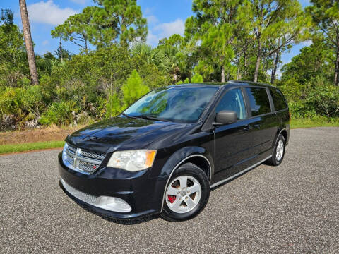 2013 Dodge Grand Caravan for sale at VICTORY LANE AUTO SALES in Port Richey FL