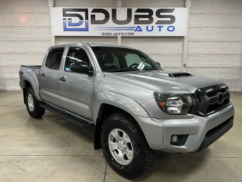 2015 Toyota Tacoma for sale at DUBS AUTO LLC in Clearfield UT