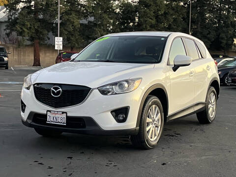 2014 Mazda CX-5 for sale at FABULOUS AUTO SALES in Davis CA
