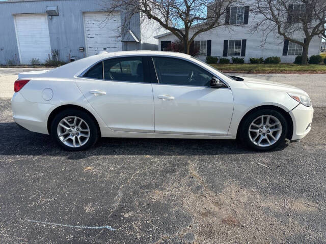 2013 Chevrolet Malibu for sale at DECKER AUTO SALES in Bay City, MI