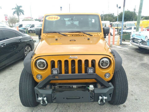 2014 Jeep Wrangler Unlimited for sale at P S AUTO ENTERPRISES INC in Miramar FL
