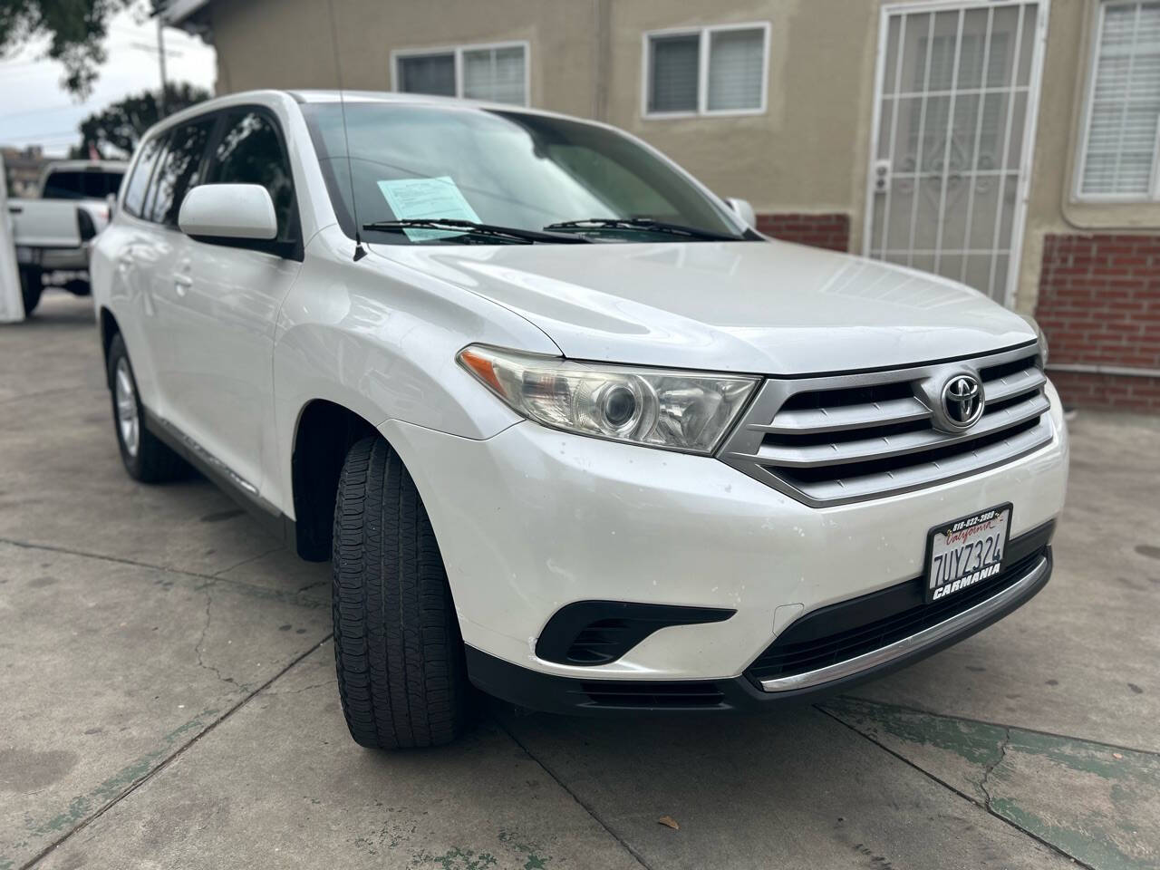 2012 Toyota Highlander for sale at Carmania in Panorama City, CA