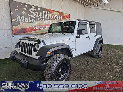 2014 Jeep Wrangler Unlimited for sale at SULLIVAN MOTOR COMPANY INC. in Mesa AZ