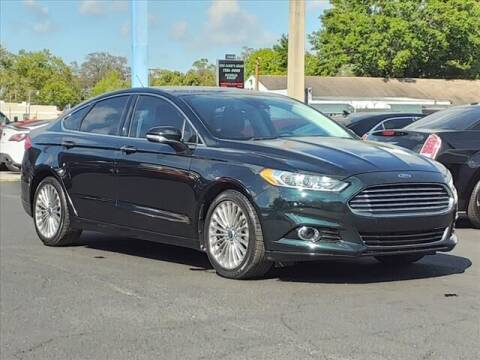 2014 Ford Fusion for sale at Sunny Florida Cars in Bradenton FL