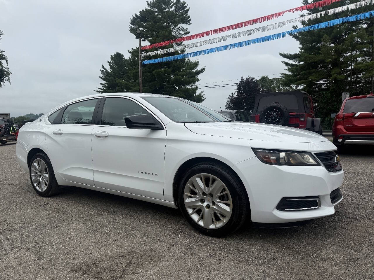 View vehicle photo 3