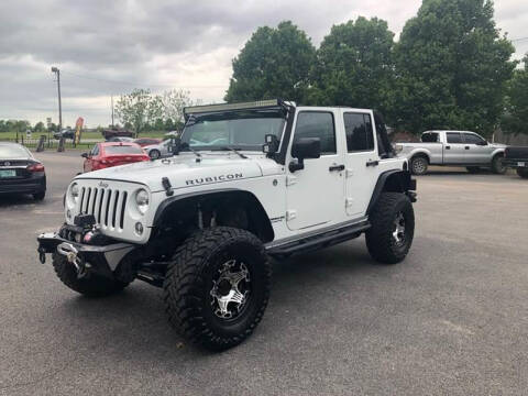 2014 Jeep Wrangler Unlimited for sale at Bagwell Motors in Springdale AR