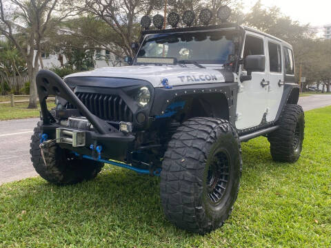 2011 Jeep Wrangler Unlimited for sale at BIG BOY DIESELS in Fort Lauderdale FL