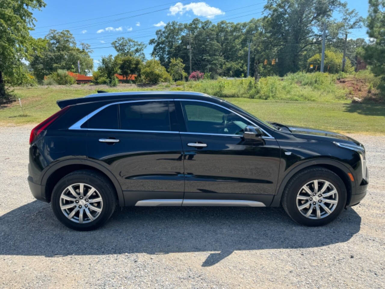 2021 Cadillac XT4 for sale at Guadalupe Auto Sales, LLC. in Jemison, AL