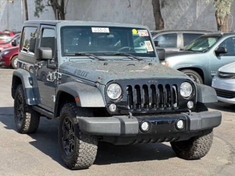 2014 Jeep Wrangler for sale at Adam's Cars in Mesa AZ