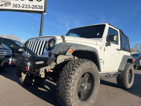 2013 Jeep Wrangler for sale at Mister Auto in Lakewood CO