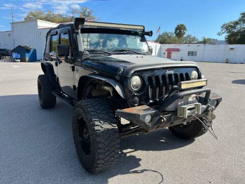 2011 Jeep Wrangler Unlimited for sale at Consumer Auto Credit in Tampa FL