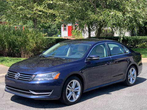 2014 Volkswagen Passat for sale at Triangle Motors Inc in Raleigh NC