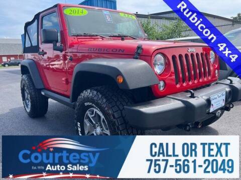 2014 Jeep Wrangler for sale at Courtesy Auto Sales in Chesapeake VA